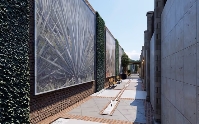 Render exterior de un desarrollo residencial con fachadas de concreto y vegetación